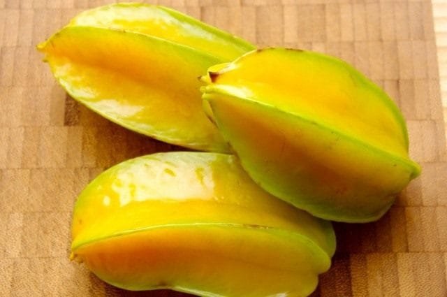 Carambola - heerlijke sterren. Hoe eten ze? Smaak. Zorg, groeien, reproductie. Foto